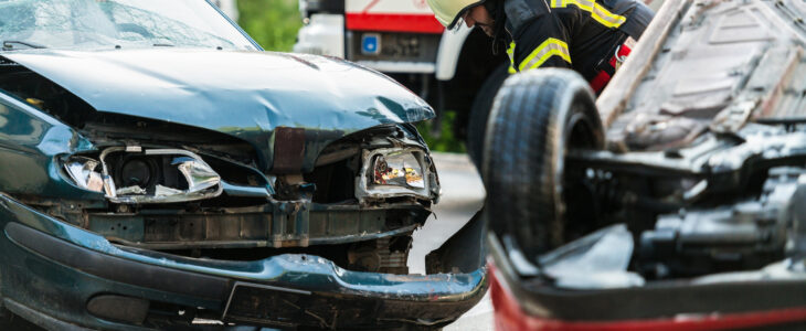 Firefighters At A Car Accident Scene