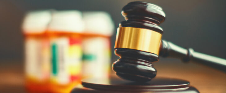 Judge's gavel with medications. Medical malpractice