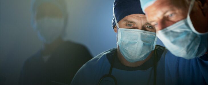 two doctors with surgical masks in a hospital